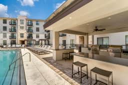 Luxury 2BR/2BA Domain Condo • Pool & Modern Décor